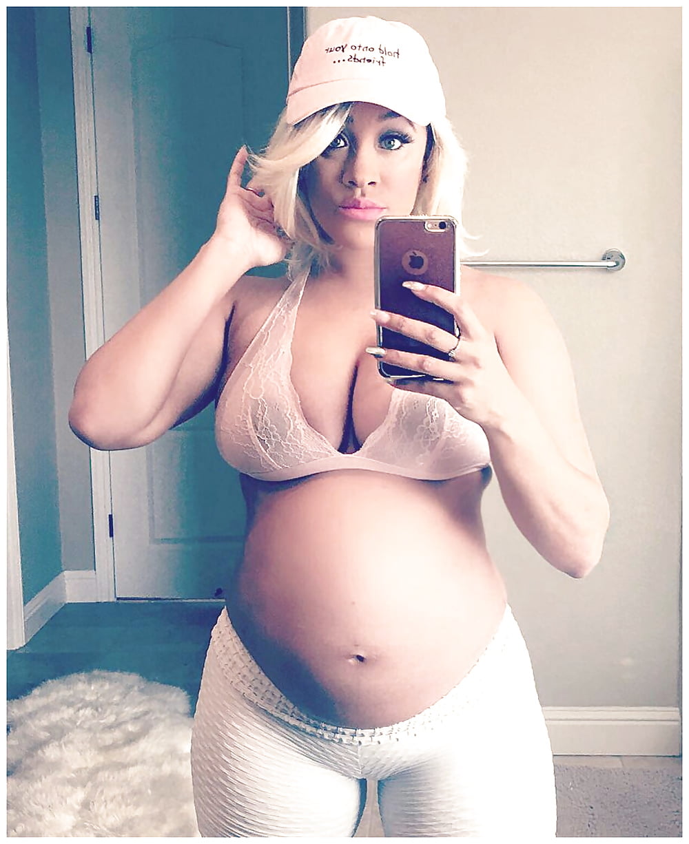 Pregnant woman with huge boobs
