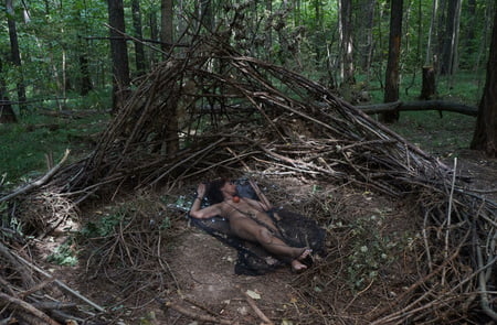 in forest cradle with apple         