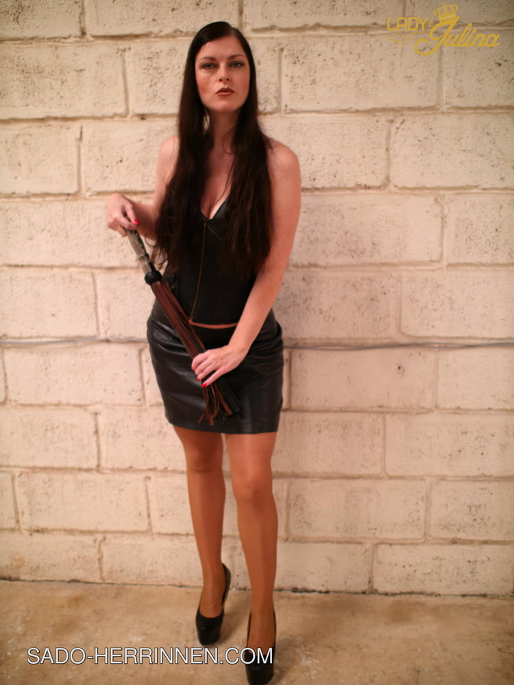 Mistress Lady Julina wears leather skirt and pantyhose - 8 Pics 