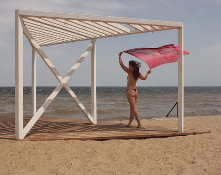 red shawl on windy weather         