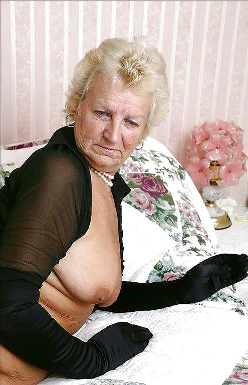 Porn Pics Grandma in bed.