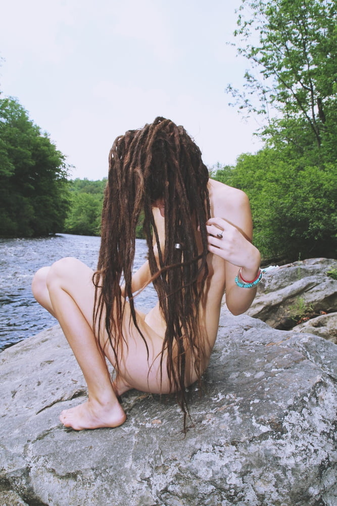 Two Naked Girl With Dreadlocks Show Their Shaved Pussies