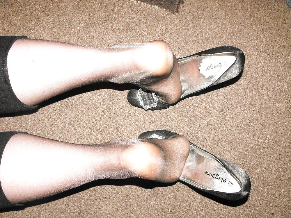 Porn Pics wearing  tights with at least 3 loads of cum in the feet!!