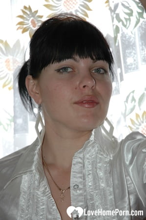 Smoking mom in stockings showing off her legs