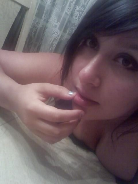 Porn Pics Busty girl photographed herself.