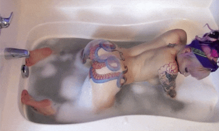 girl-octopus-tattoo-naked-gif