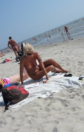 Blond Girl Nude on the Beach