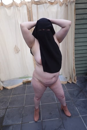 nude in niqab in ankle boots         