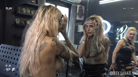 dirty sarah bitch got her forehead tattooed         
