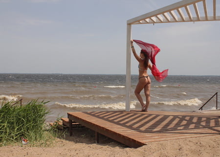 red shawl on windy weather         