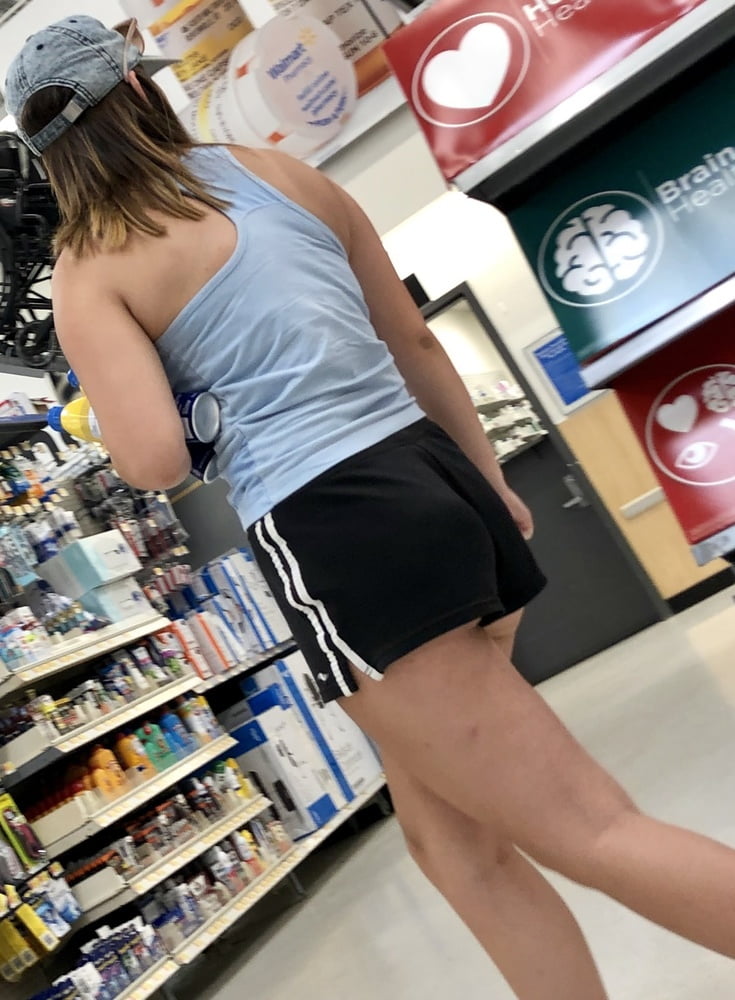Sexy teen in walmart, stuffing three golf balls up pussy