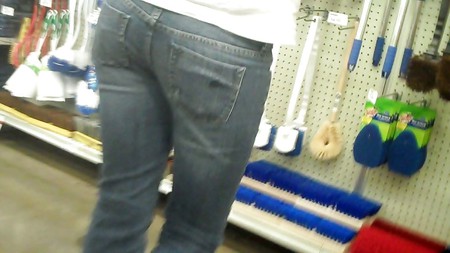 Her ass & butt in jeans at the store
