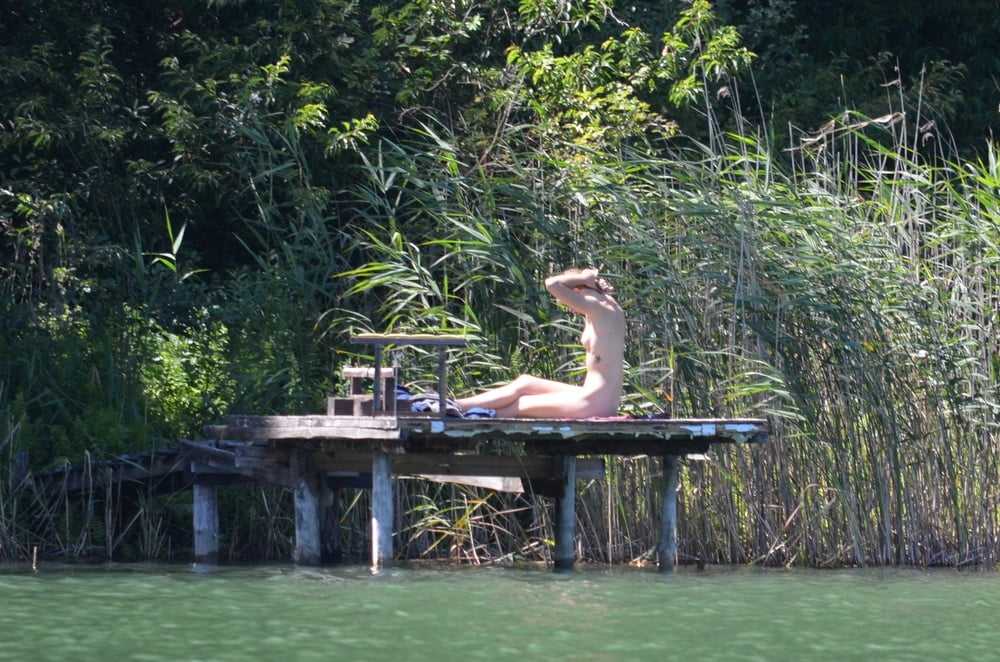 Sunbathing naked Voyeur - 24 Photos 
