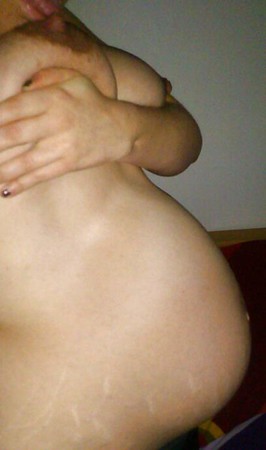 pregnant belly with me licking my leaking breast