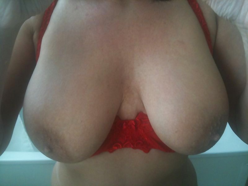 Porn Pics my gf,s gorgeous tits in a sexy red bra