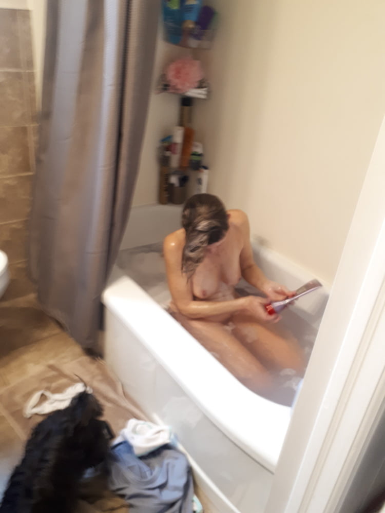 Unsuspecting Wife Milf In Bath Nice Boobs 4 Pics