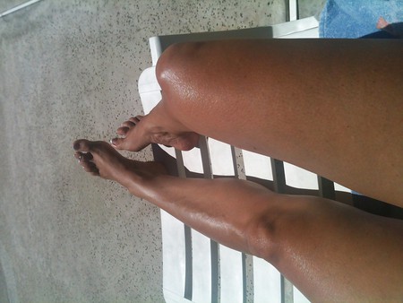 Tanned summer legs and feet