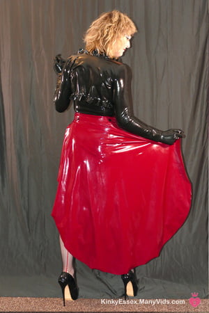 long red latex skirt with fishnets and sexy heel pumps         