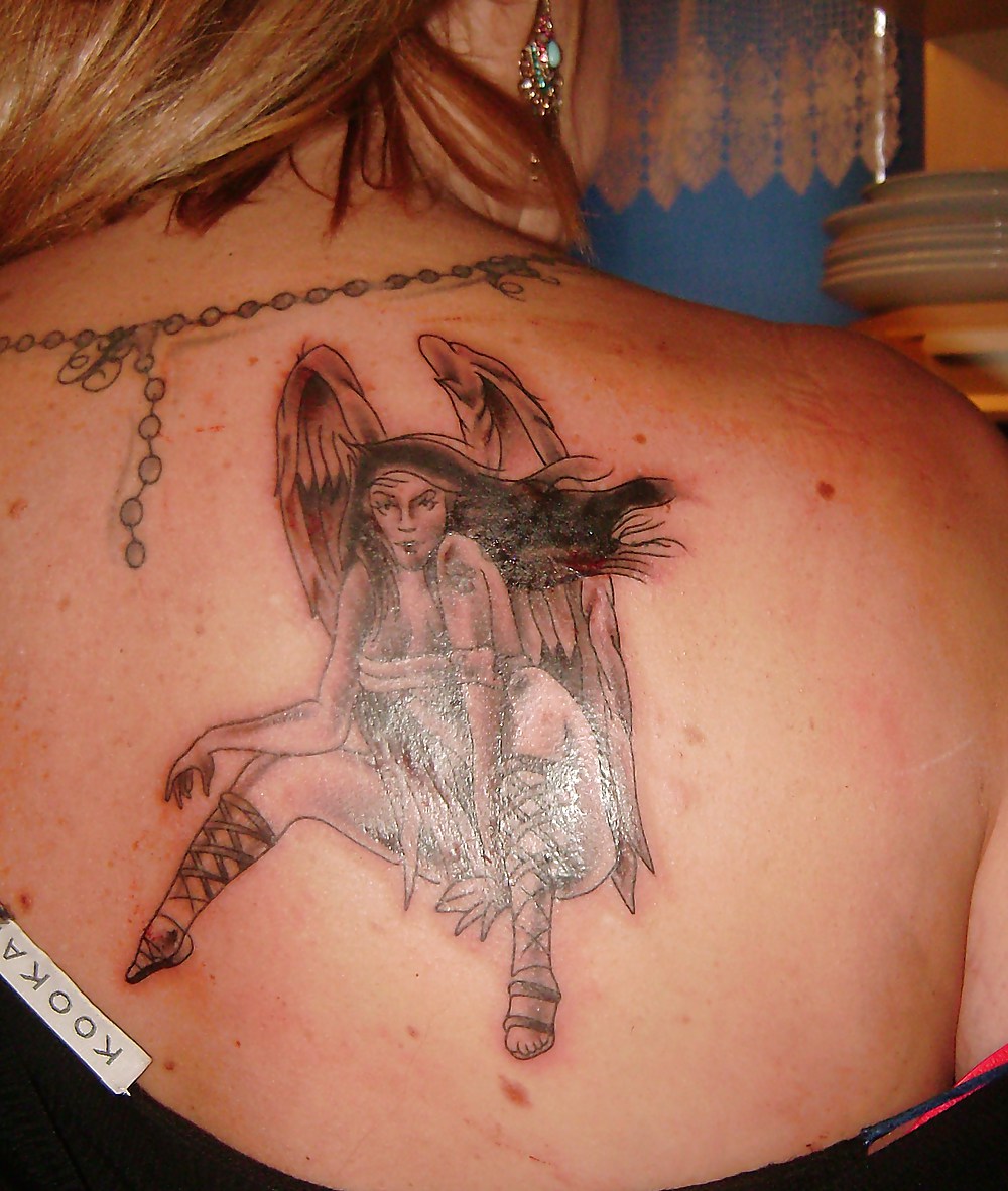 Porn Pics naughty angel tattoo