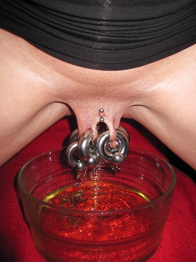 Porn Pics Amateur showing her huge piercings