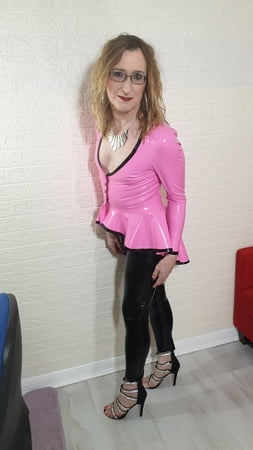 pink riding jacket and black leggings from latex and lovers         