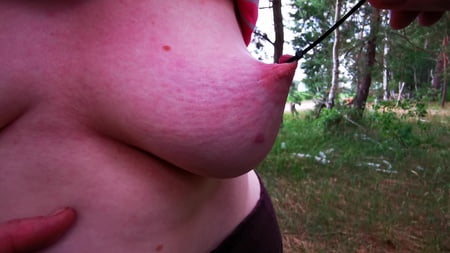 painful using her nipples in public         