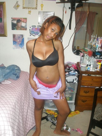 Pretty Ebony Teen In Bedroom Showing Huge Tits