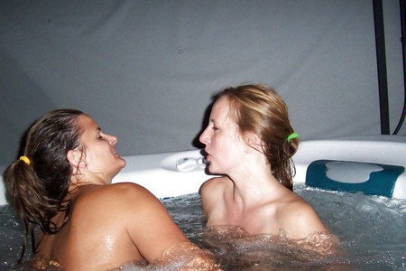 Hot lesbian action in the jacuzzi